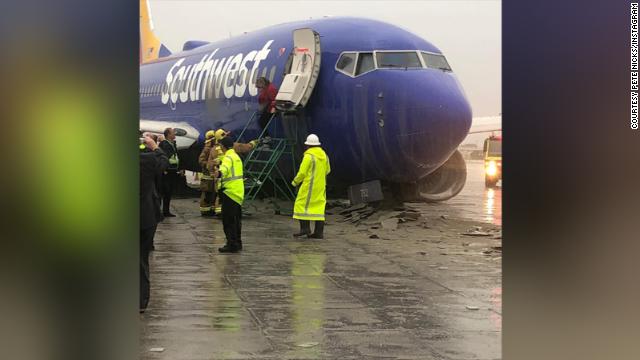 A Southwest Airlines flight slid off a runway at California's Hollywood Burbank Airport during heavy rain, the FAA says. No injuries are reported. https://cnn.it/2E23VYG