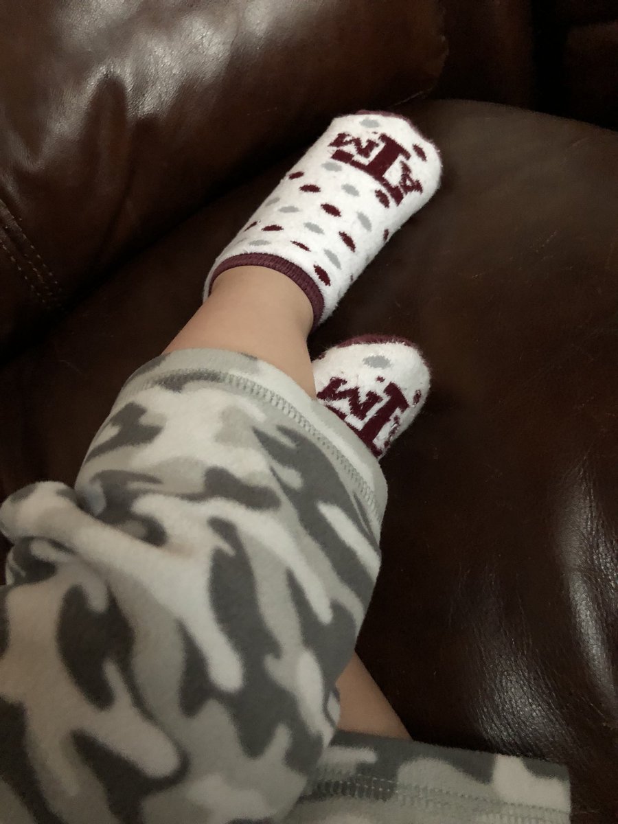 AmyMClarkTX's tweet photo. My little guy’s #SocksForBush salute today as #41 is brought to his final resting place in College Station. Rest In Peace, President Bush 🇺🇸 https://t.co/JZW14MwoJr