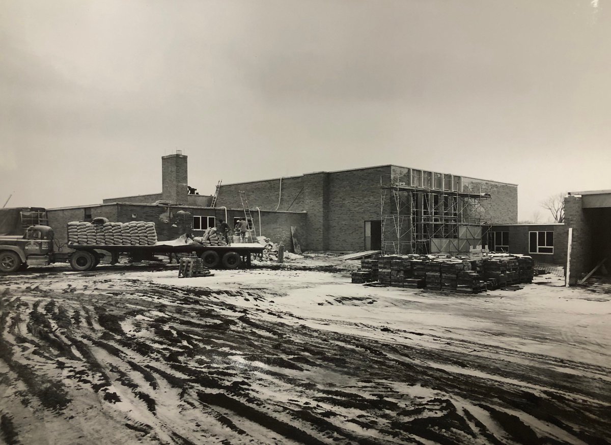 OPSchools's tweet photo. In recognition of Ellicott’s 50th here is a photo of Ellicott's construction in 1965.  You can see the scaffolding on the north side of the cafeteria, pallets of bricks &amp; a truckload of cement. #EllicottTurns50 #OPCSDThrowbackThursday #OPCSDHonorsOurHistory #120YearsofExcellence https://t.co/W2BNV58eoD