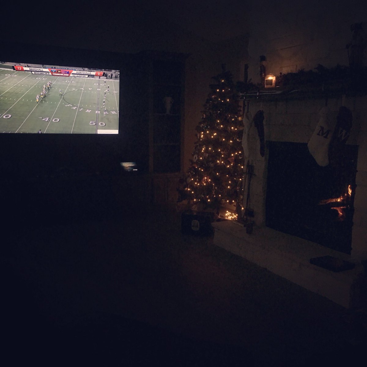aewalker613's tweet photo. Iโm so sad we couldnโt make it to the game tonight, but this is the second best thing. Hornets on the big screen and a fire in the fireplace. Letโs do this boys!! #throwthatball #notdoneyet #stingem https://t.co/iMBbrMWLyt
