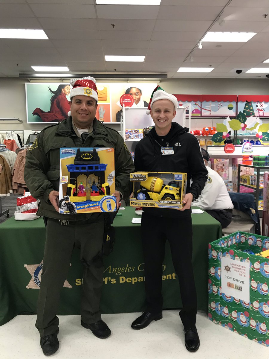 LANLASD's tweet photo. Our #StuffaHumvee Toy Drive is in full swing! Our Humvee is nearly full! 

Recruits from Class #434 happened to be on ride alongs with our deputies as part of their academy requirements &amp; stopped by too! Let’s keep going AV! We’ll be at @Target until 8pm!

#LASD #AV411 https://t.co/VjcFbHcyhb