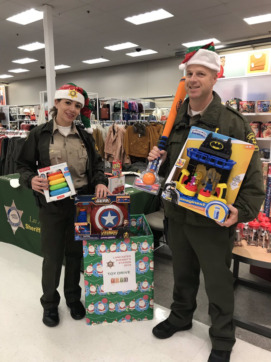 LANLASD's tweet photo. Our #StuffaHumvee Toy Drive is in full swing! Our Humvee is nearly full! 

Recruits from Class #434 happened to be on ride alongs with our deputies as part of their academy requirements &amp; stopped by too! Let’s keep going AV! We’ll be at @Target until 8pm!

#LASD #AV411 https://t.co/VjcFbHcyhb