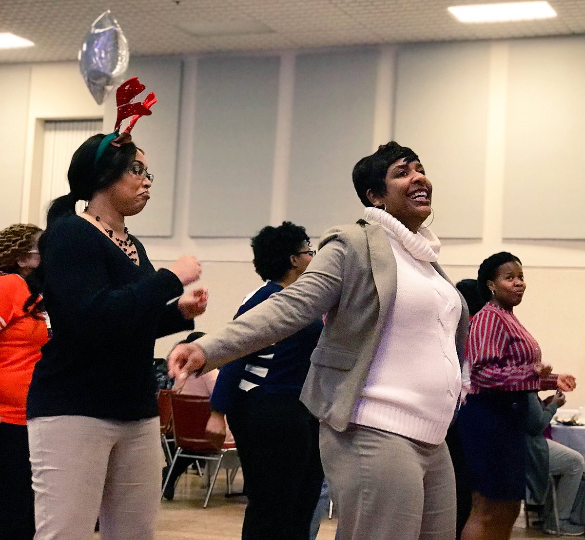 MSCSK12's tweet photo. Congratulations to our new teachers on their first semester! Along with their mentors, they gathered together tonight to mix, mingle, share their stories, and have a good time! Shout out to our ugly sweater finalists and soul train stars! #teacherturnup #SCSis901 https://t.co/mkphVmcOWq