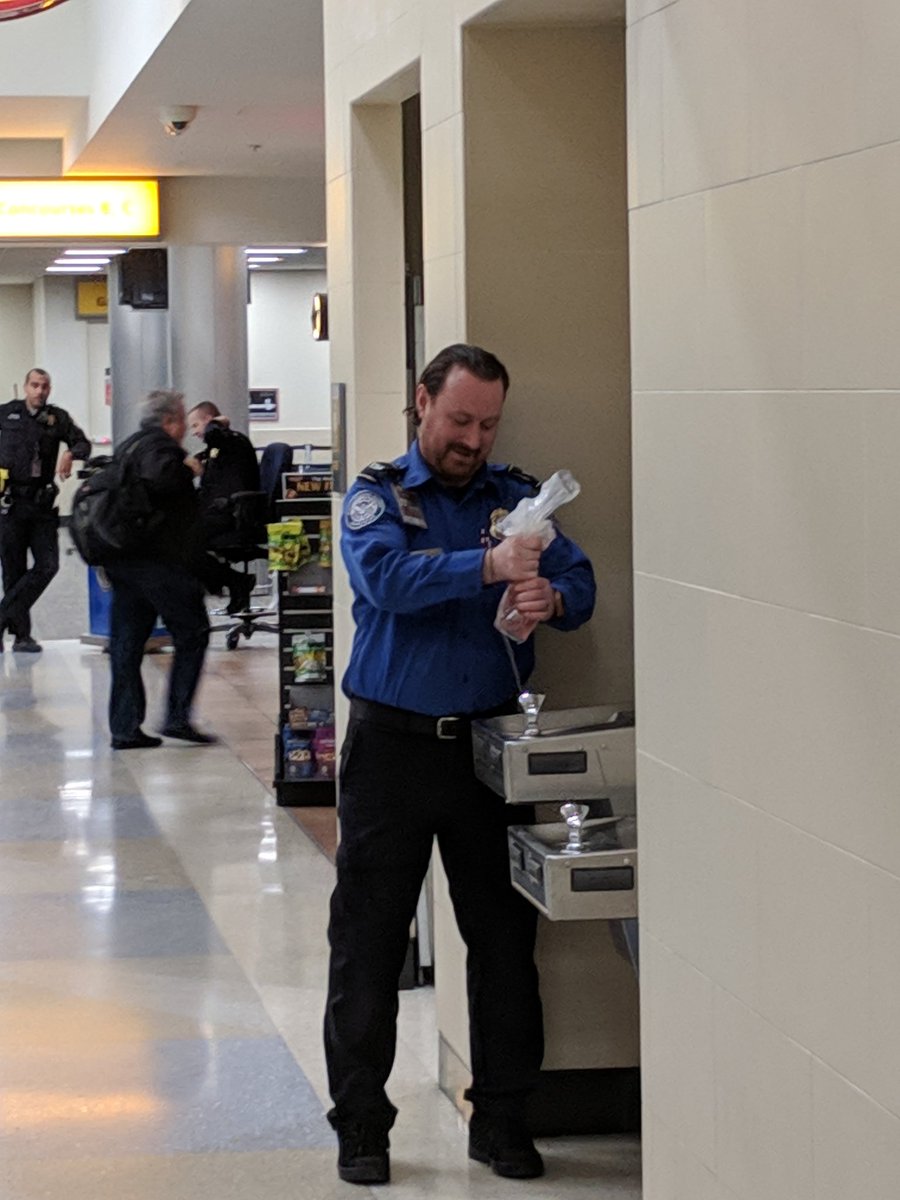 markirvin64's tweet photo. I've seen a lot of odd stuff in airports. But @TSA dumping a bag of wine is a first. It wasn't mine, but I got a good laugh. Said someone had it around their waist. #fullbodyscanner https://t.co/94AGewv1qN