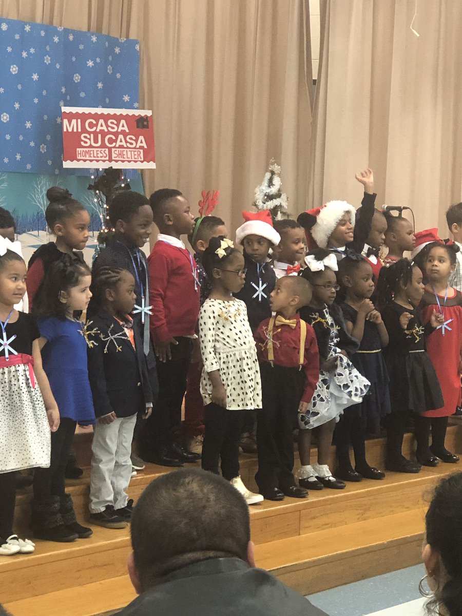 This is how you know your child’s teacher is AMAZING!! She ties shoes during the Christmas program!!