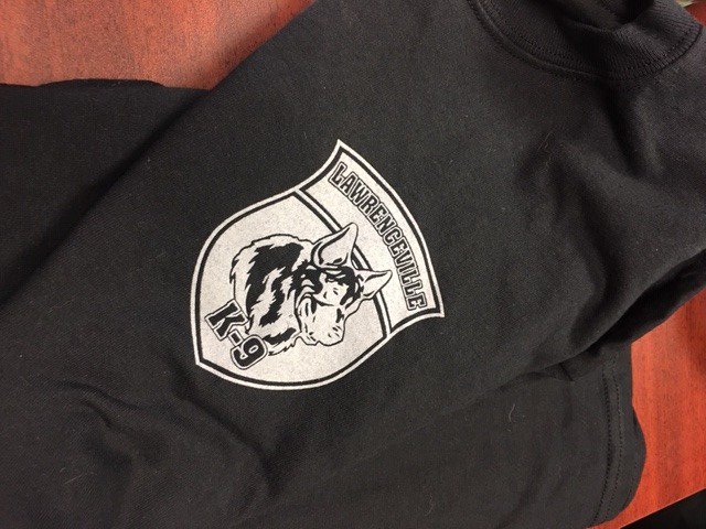 LawrencevillePD's tweet image. When @Hyro171  reaches 300 followers, we will select one to receive a Lawrenceville K9 t-shirt.  Sorry but we only have the X-L size at the moment.  First pic is the front, second is the back. Thanks @Nitedog137