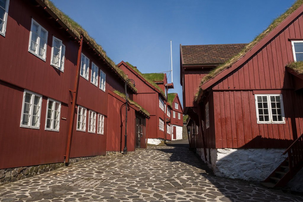 Take Torshavn, the capital city of the Färö islands in the North Atlantic and completely modern. Its old quarter, Tinganes, is built largely with green sod roofs, a densely populated (for this climate) urban environment.