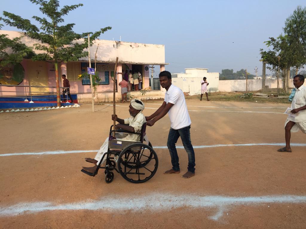 DEO_MBNR's tweet photo. An elderly voter is escorted to polling station by NSS Volunteer #accessible #elections2018 @Collector_MBNR @sivamenaan @Jointcollector1 @SpokespersonECI https://t.co/qJ4uhM7ba5