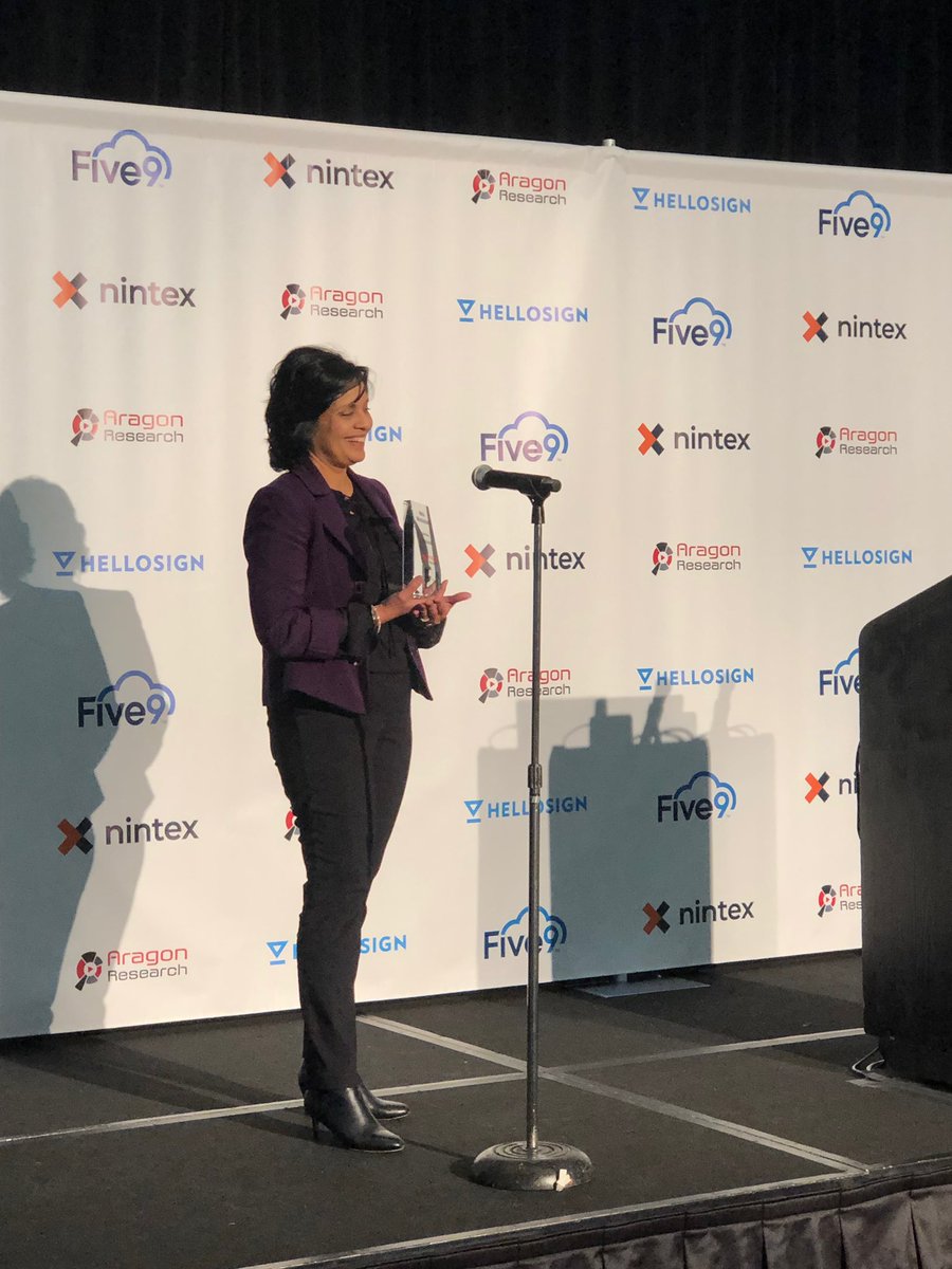 RingCentral's tweet photo. .@nmirchiโs smile says it all! Congratulations to our VP of Corporate Marketing on winning the @AragonResearch1 #WomenInTech18 Award! ๐ #AragonTransform18 https://t.co/9X4R70lGq9