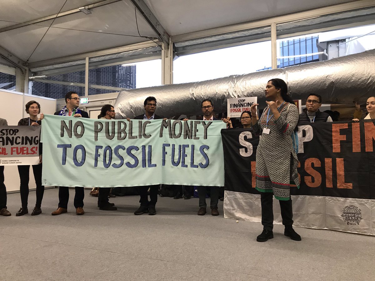 ConflictsAtCOP's tweet photo. Banks financing fossil fuels are SHAMELESS. They seem to have absolutely no problem with funding our climate crisis! Do better @EIB 😡 #COPspiracy #PollutersOUtPeopleIn #GasStinksCOP24 https://t.co/C1X2zwa3IV