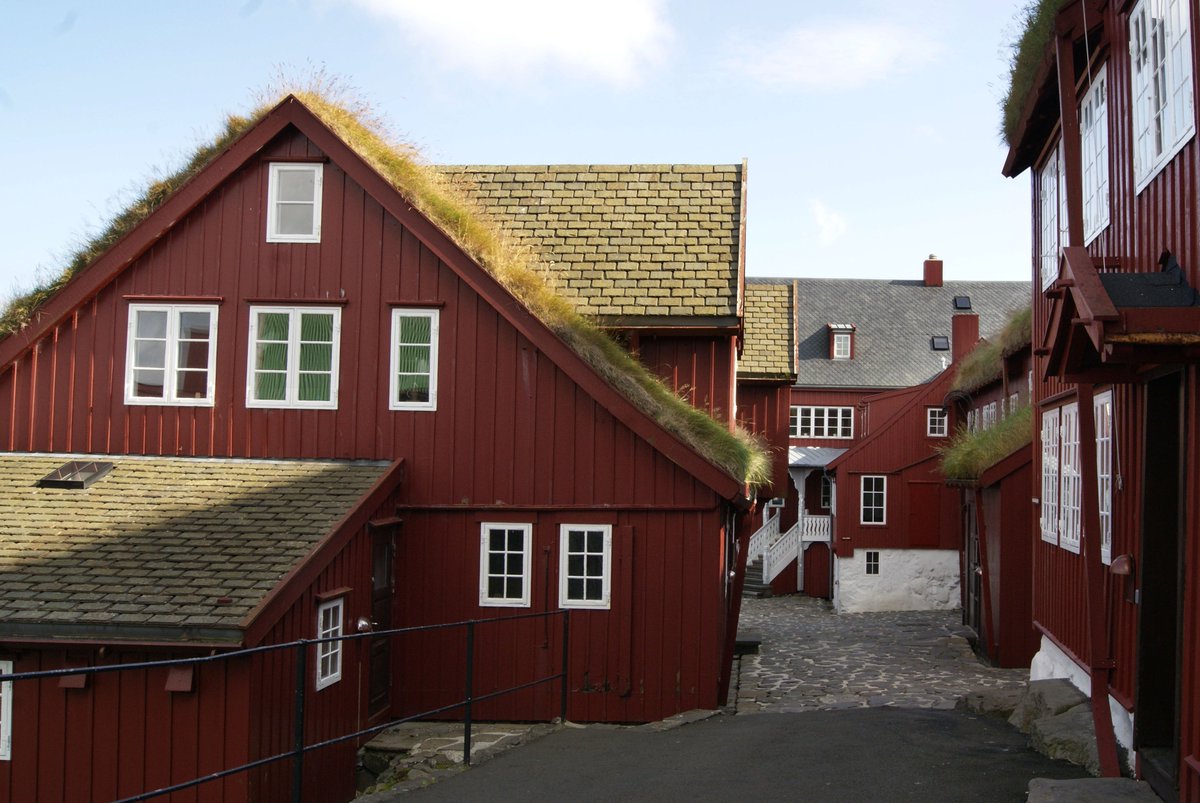 Another interesting thing with sod roofs versus modern roof materials: they fit right in. Look at these faux and synthetic slate roof next to a couple of real sod roofs. The sod roofs (who might be newer) does not look out of place, unlike most modern materials, always jarring.