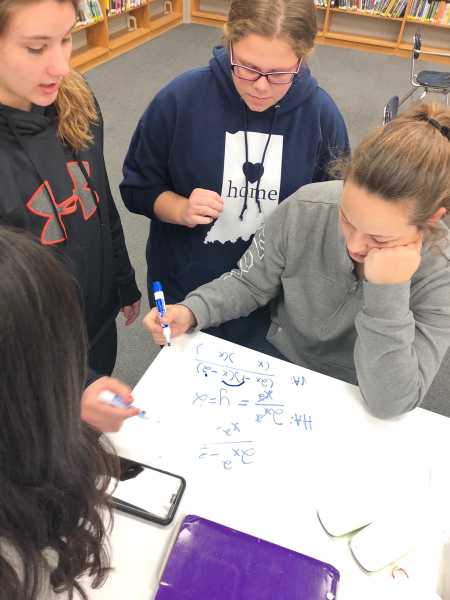 LHS Trig students use the innovative dry erase media center tables to prepare for their final today.  #innovativefurniture