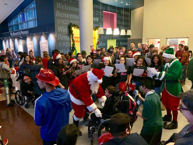FDNY's tweet photo. #FDNY members from #Engine320 and #Ladder167 joined Santa, @hotdogfdny and @sirenfdny and to spread holiday cheer to all at @StMarysKidsNY in #Queens https://t.co/Ut82OBvuBx