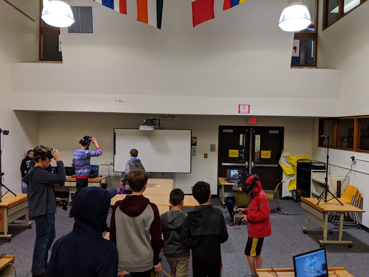 ICSDEdTech's tweet image. Watching the engagement and excitement of @IthacaNYSchools students using @htcvive was a great way to end December. Thanks to @ASc1ence @angelaEdTech @HeatherTechTST and the DeWitt Library staff for providing this opportunity. #ICSDEdTech #VirtualReality