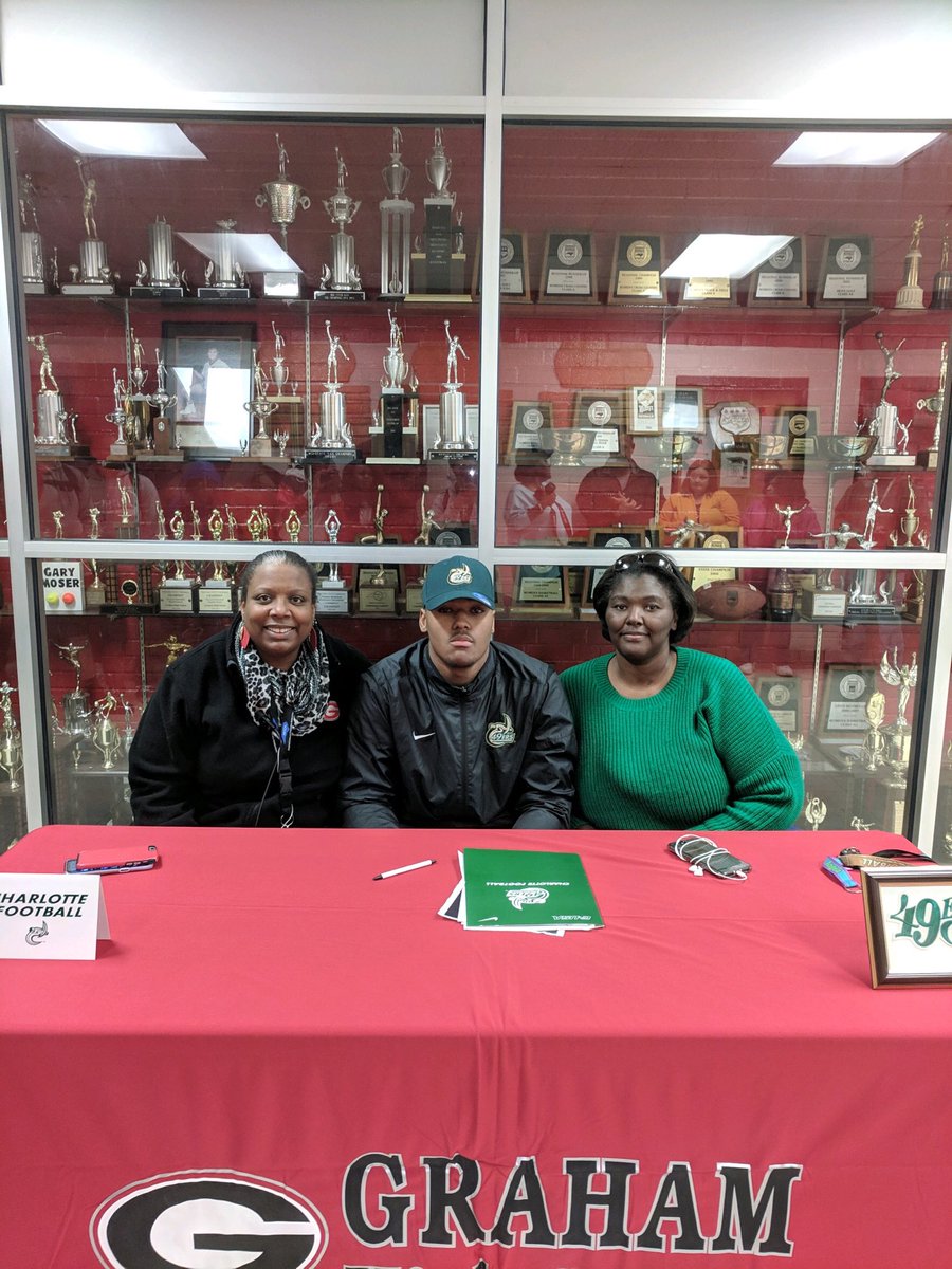 CoachABSS's tweet photo. So proud of this guy signing with UNCC to play FB & get his education! Congrats, Michael! #teamThinkRED https://t.co/9zPh08IW3P