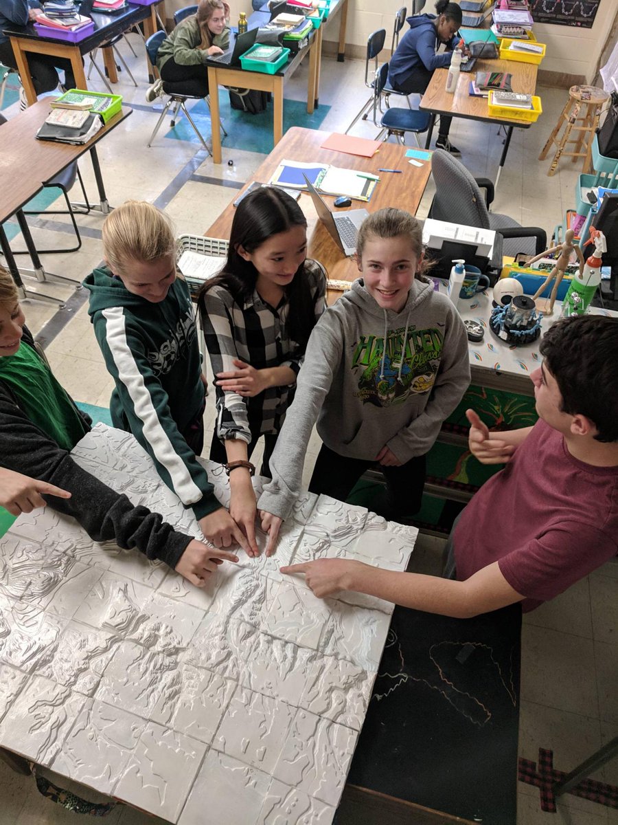 BataviaBMS's tweet photo. 8th grade science students worked in groups to build the topography model of downtown Batavia.  In the 2nd picture students sre pointing to the location of BMS. https://t.co/TMJQZpCH78