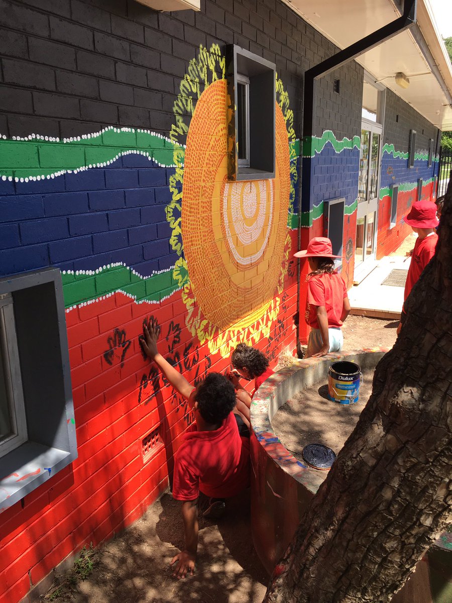 LowreyDeborah's tweet photo. So proud of our NAPS indigenous students and our Community Indigenous Mural. 600+ kids,families &amp; staff contributed. 2 terms of researching, design and painting with our Koori artists @jakkikenney and @elinorarcher #northainslieprimary #ACTpubliceducation #culturalintegrity https://t.co/A2w6vMv7Ya