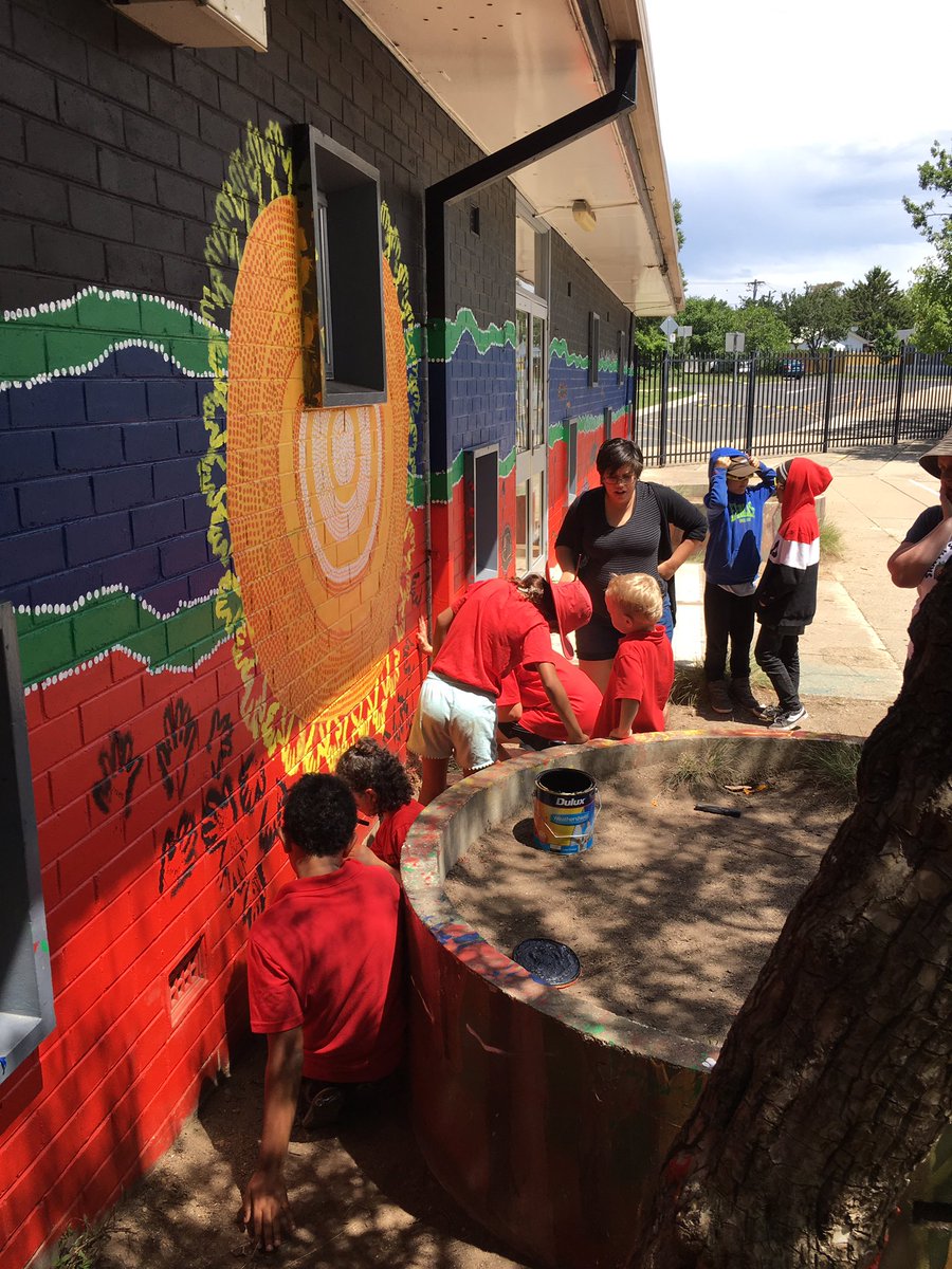 LowreyDeborah's tweet photo. So proud of our NAPS indigenous students and our Community Indigenous Mural. 600+ kids,families &amp; staff contributed. 2 terms of researching, design and painting with our Koori artists @jakkikenney and @elinorarcher #northainslieprimary #ACTpubliceducation #culturalintegrity https://t.co/A2w6vMv7Ya