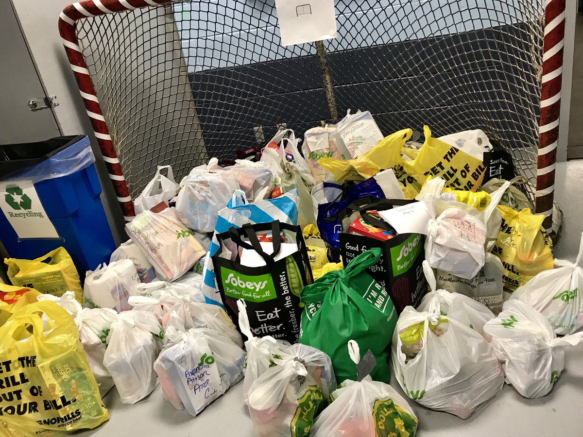 What an AMAZING show of support for our local community food banks. Congratulations to our Atom A Flames for winning the free ice time by bringing in a whopping 56 bags!