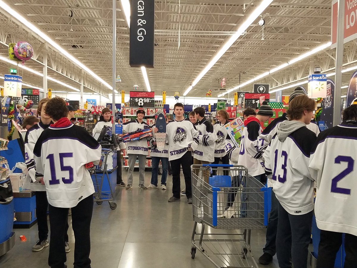 AD_Stoughton's tweet photo. Proud of Stoughton boys hockey who went Christmas shopping last night for those in need. The team is donating them to the local VFW today.  #StoughtonStrong https://t.co/9mj9czukJx