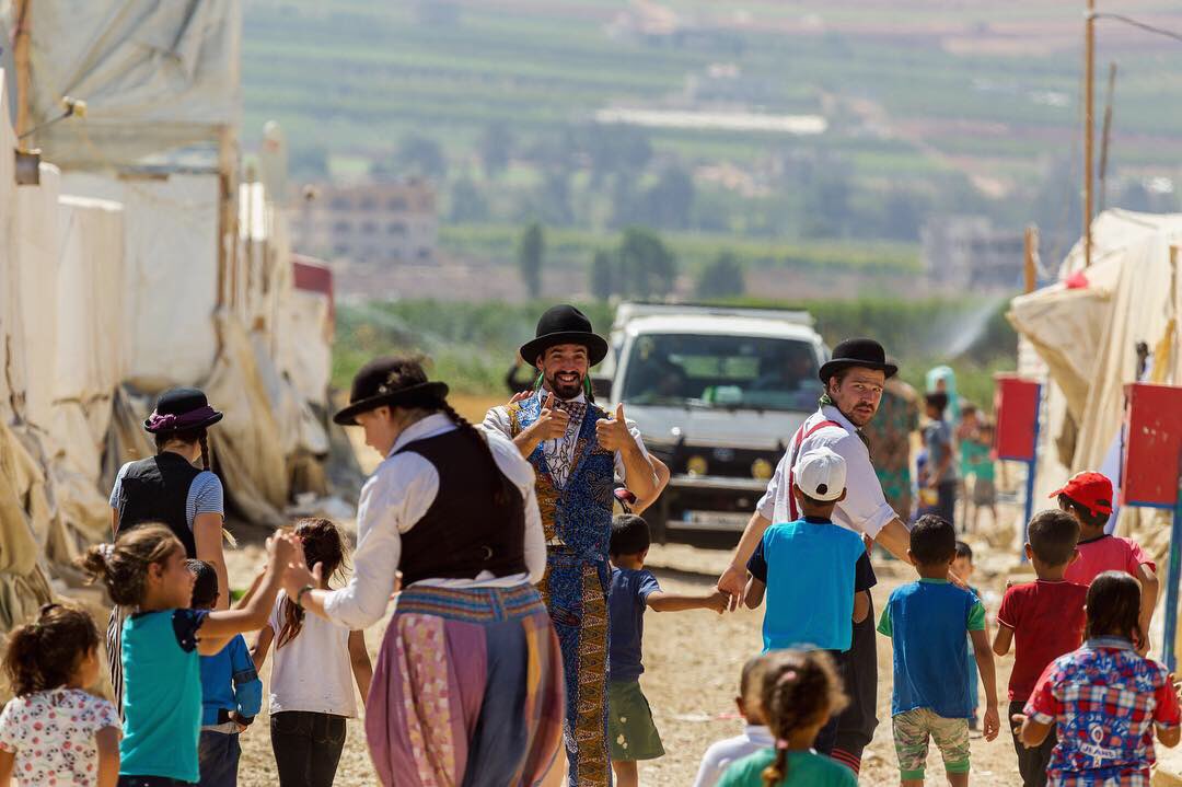 FlyingSeagullUK's tweet photo. For day 20, we have some new photos from Lebanon! These were taken in the Bekaa Valley, where 10s of thousands of refugees live in the most basic conditions. In a place like this, play and laughter are luxuries. Thanks to your support, our team put this right one smile at a time https://t.co/AJY29LJf1t