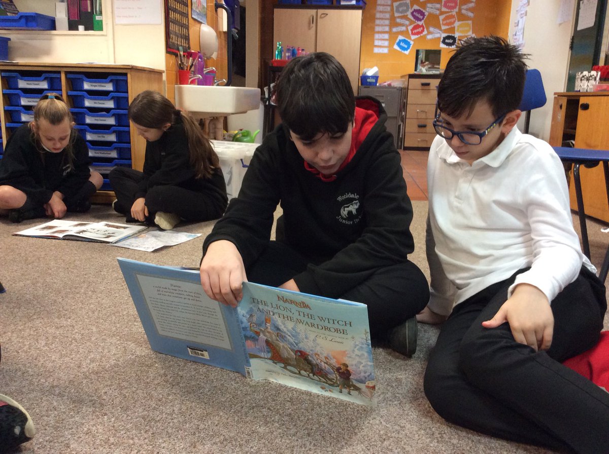Year6New's tweet photo. Warm and cosy shared wintertime reading in Years Four and Six. https://t.co/7gRykBw3Ij