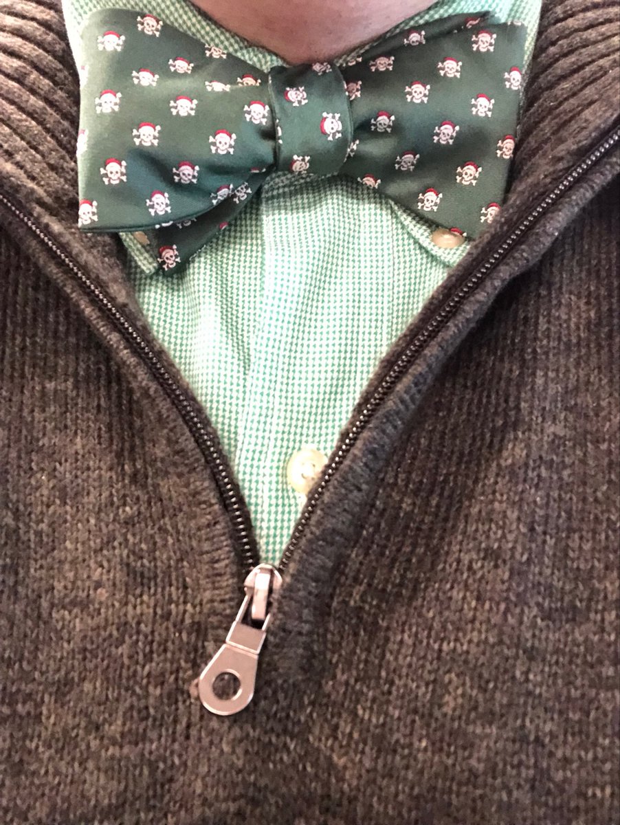 Joel_K_Kramer's tweet photo. #DailyTie Skulls with Santa hats. #festive #tiesdotcom https://t.co/M52xjUrlF2