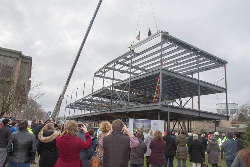 RWUCM's tweet photo. A few more photos from the recent steel topping off ceremony during the construction of our new SECCM Labs building in Bristol, RI. #rwucm #construction #education #experiential #collaborate #leadership #vision https://t.co/dEl1KnnGwY