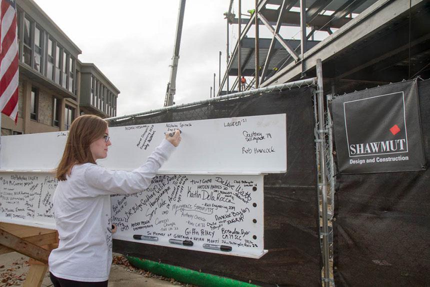 RWUCM's tweet photo. A few more photos from the recent steel topping off ceremony during the construction of our new SECCM Labs building in Bristol, RI. #rwucm #construction #education #experiential #collaborate #leadership #vision https://t.co/dEl1KnnGwY