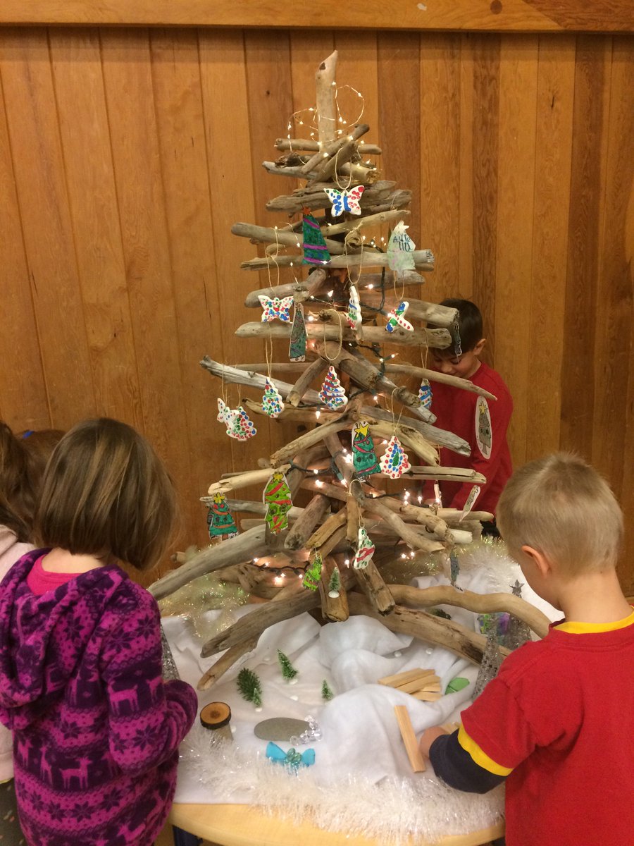 MargotLandahl's tweet photo. Students gather, build and decorate our driftwood Christmas tree! Problem solving like Salmon and creating like Raven! #6cedars https://t.co/I4Z4ngK7w1