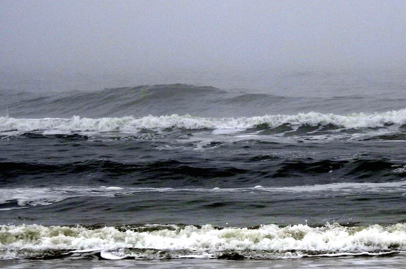 CorollaSurfShop's tweet photo. Corolla has a steady rain, warm air temps and choppy kneecap high surf at this posting H20 is 46 degrees and air temp is a warm 61 degrees Fahrenheit. The wave forecast is for the surf to start building this afternoon and possible peak out a head high sometime tomorrow: #corolla https://t.co/9fgUsrtPxs