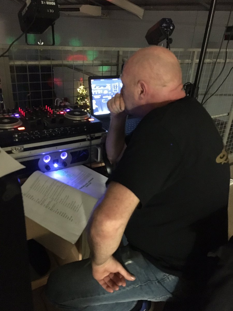 DJ Gaz, concentrating on the  dialogue to keep the show music on track 🎧🎼