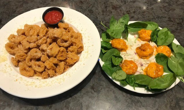 Boom Boom Shrimp w/house slaw and Calamari.
Double trouble.
Tastes so good you might not want to share, Ebeneezer.