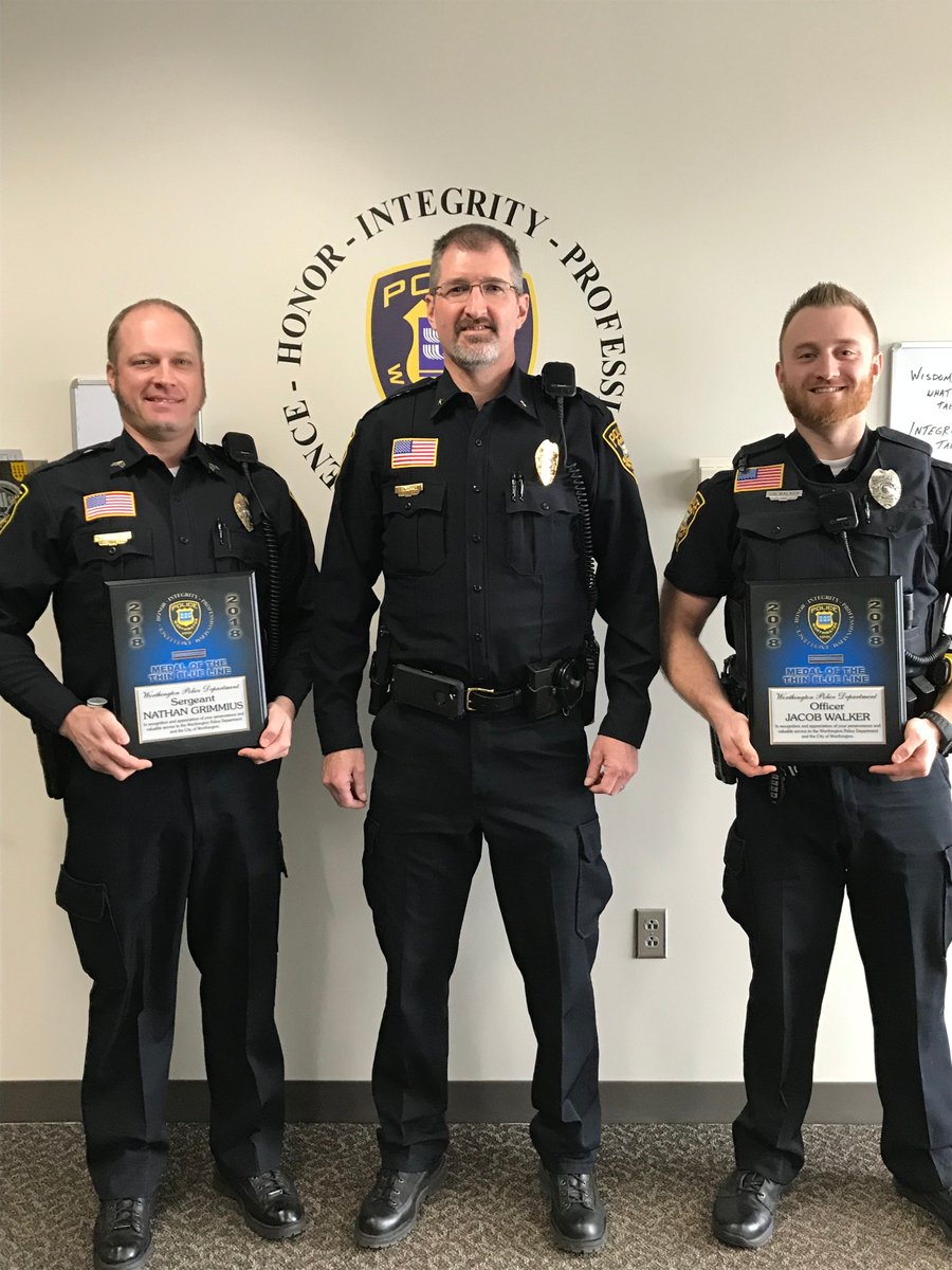 Detective Sergeant Nate Grimmius and Canine Officer Jake Walker received department awards today for dedicated service above and beyond the call of duty. Chief Appel presented them both with the Thin Blue Line Award.