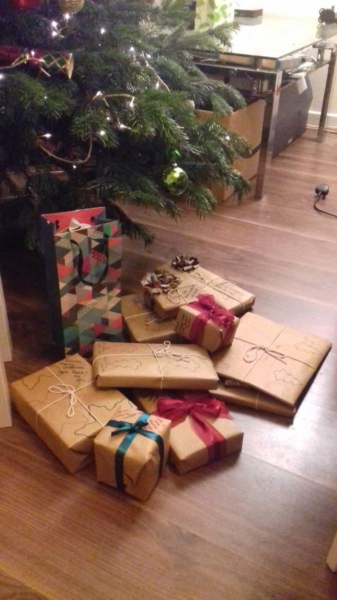 RachelBertram3's tweet photo. Feeling proud of my Christmas wrapping this year: everything is either recyclable or re-usable! Not sure how the family will feel about the no sellotape but I'm pleased #sustainablechristmas #christmaswrapping #recycle #noplastic #reuse https://t.co/kmdkQmCLT8