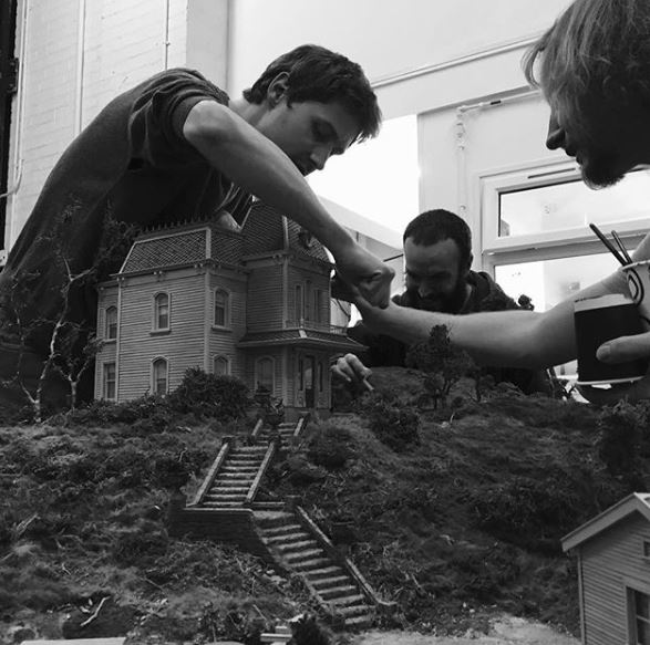 NFTSFilmTV's tweet photo. Here’s another of our favourite NFTS #Instamoments from 2018! Model Making students Thanos and Alastair make final touches to their impressive replica of the house from #Hitchcock’s #Pyscho #modelmaking #propmaking https://t.co/owGNicRdzS