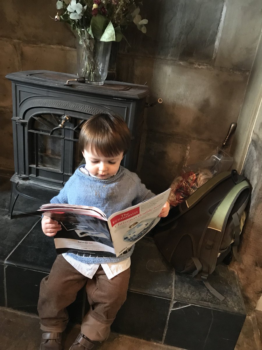 Executivefocus's tweet photo. Not quite 2 and engrossed in the Economist @TheEconomist https://t.co/ZoZjx42Fgj
