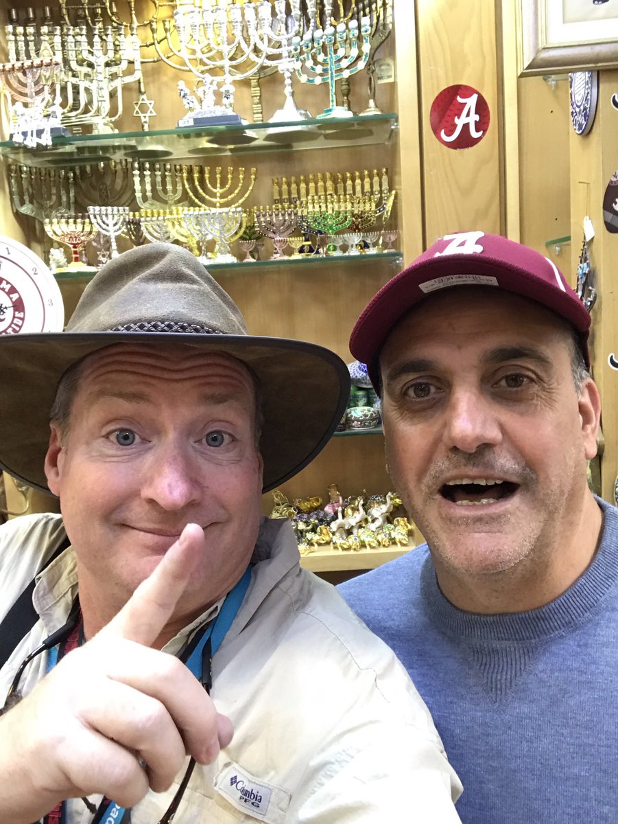 pastorbill_srbc's tweet photo. With the owner the world famous Alabama Heart of Dixie store in the old city of Jerusalem!  #rolltidefriday https://t.co/RUFjQSaeEL