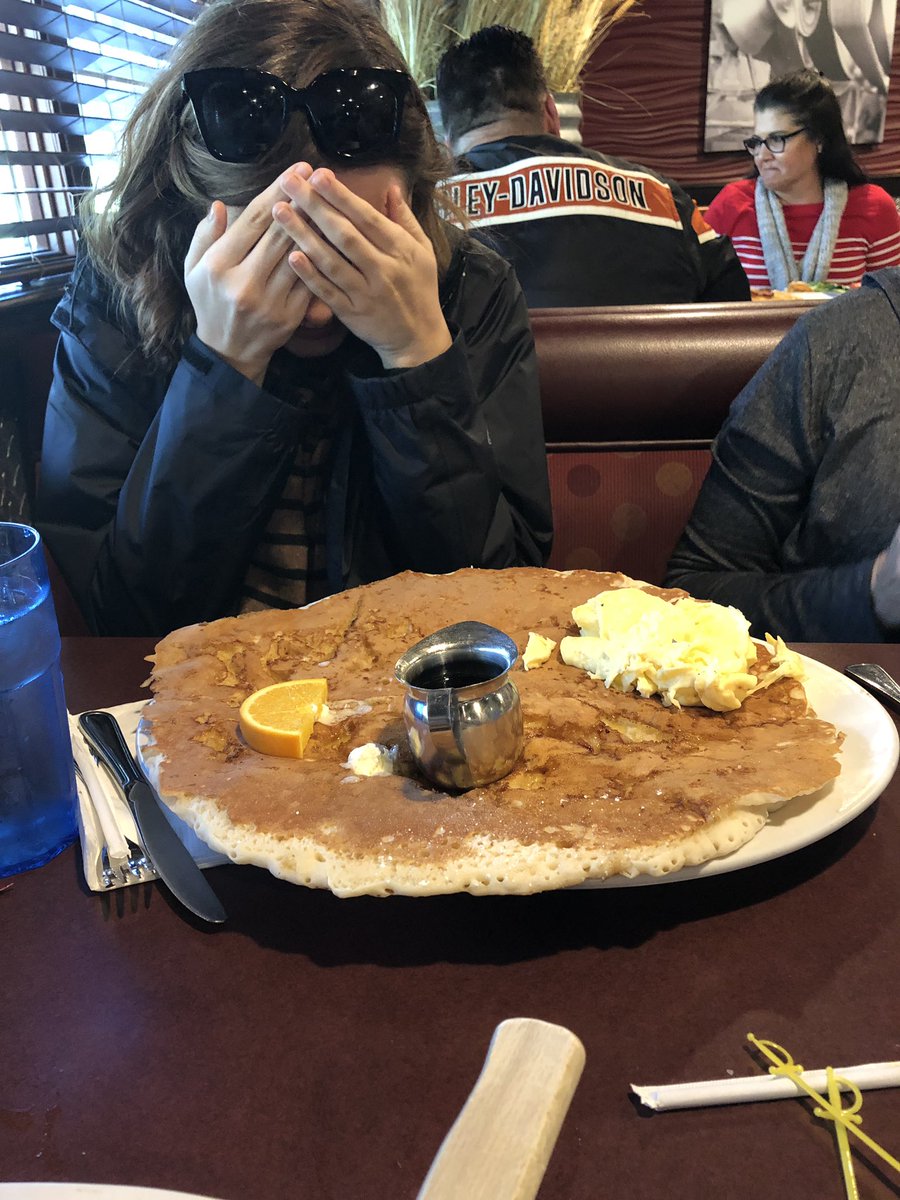 davidbhuffman's tweet photo. When @hannahhuffman realizes the waitress @HashHouseAGoGo wasn’t kidding about the size of the pancake. https://t.co/BSamrrHr41