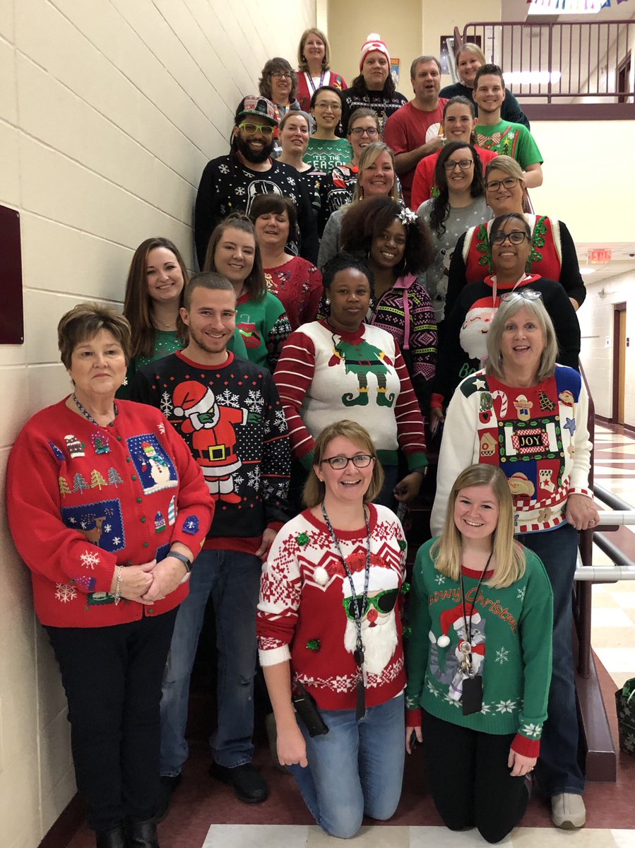 RosaPTweets's tweet photo. The best staff ever wearing the ugliest Christmas sweaters. ❤️ Happy Holidays from the Panther Staff!  #RosaParksPanthers  #MiddieRising https://t.co/F09hjfscRZ