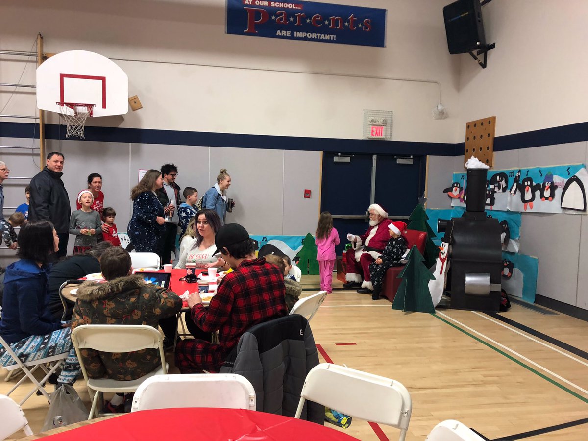 OKLandingSchool's tweet photo. Pancake breakfast with a special appearance by Santa @OKLandingSchool. Building memories and school community! @SD22Vernon  #community #teachers https://t.co/LGuBcFPec1
