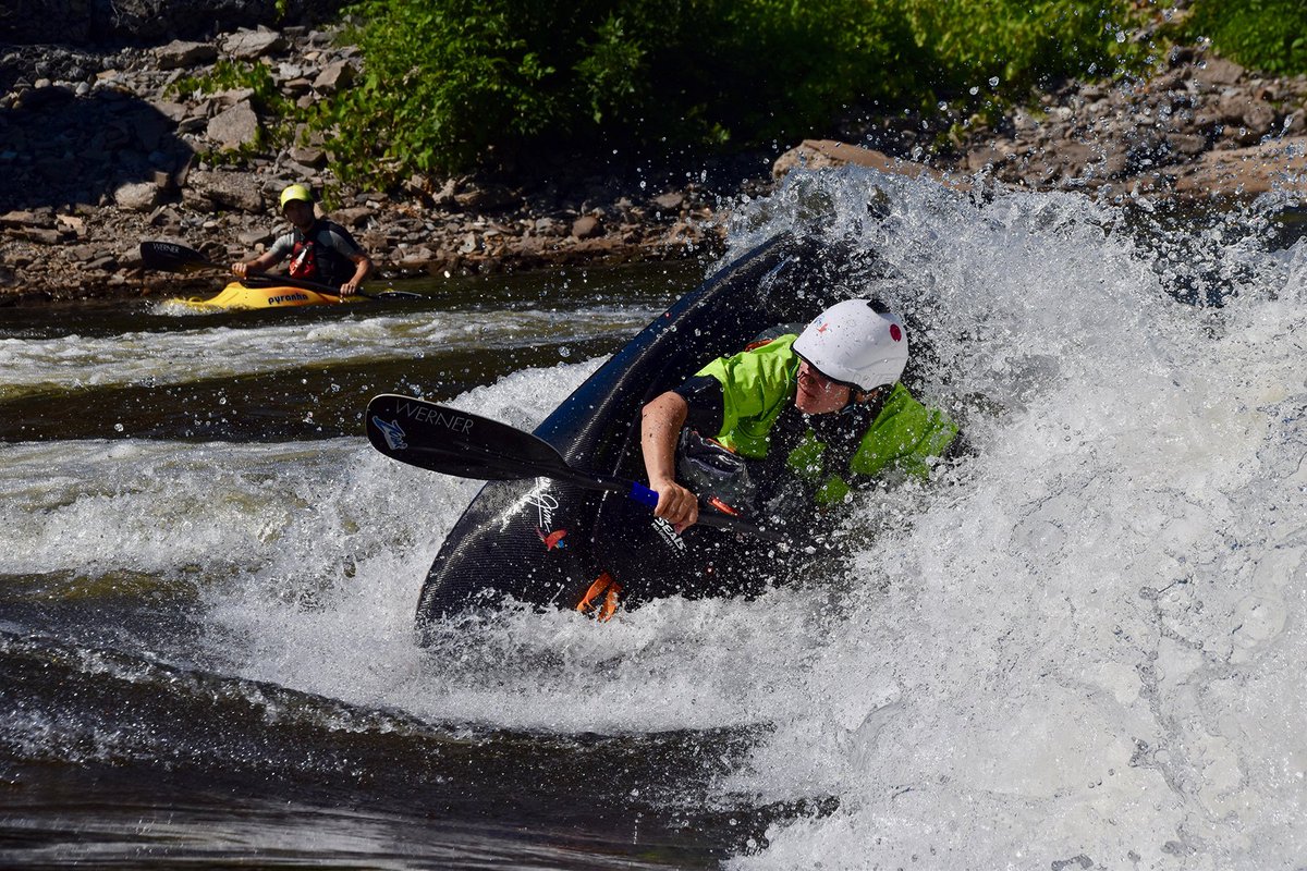 Elaine Campbell, team athlete, paddling a hole on the Brothers Black River, NY 📷 Andrew Nitschke