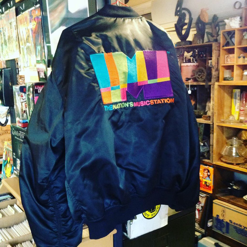 4thisandthat's tweet photo. Wow. Just in: Awesome, rare,  80's/90's Vjay bomber jacket from Much Music! This will NOT last long... #ptbo #funkifyyourlife #kawarthas #vintage #modern #gifts #collectibles #vinyl #art #decor #jewelry #comics #popculture #muchmusic #canadianmade #shoplocal https://t.co/FDyy3e9MDw