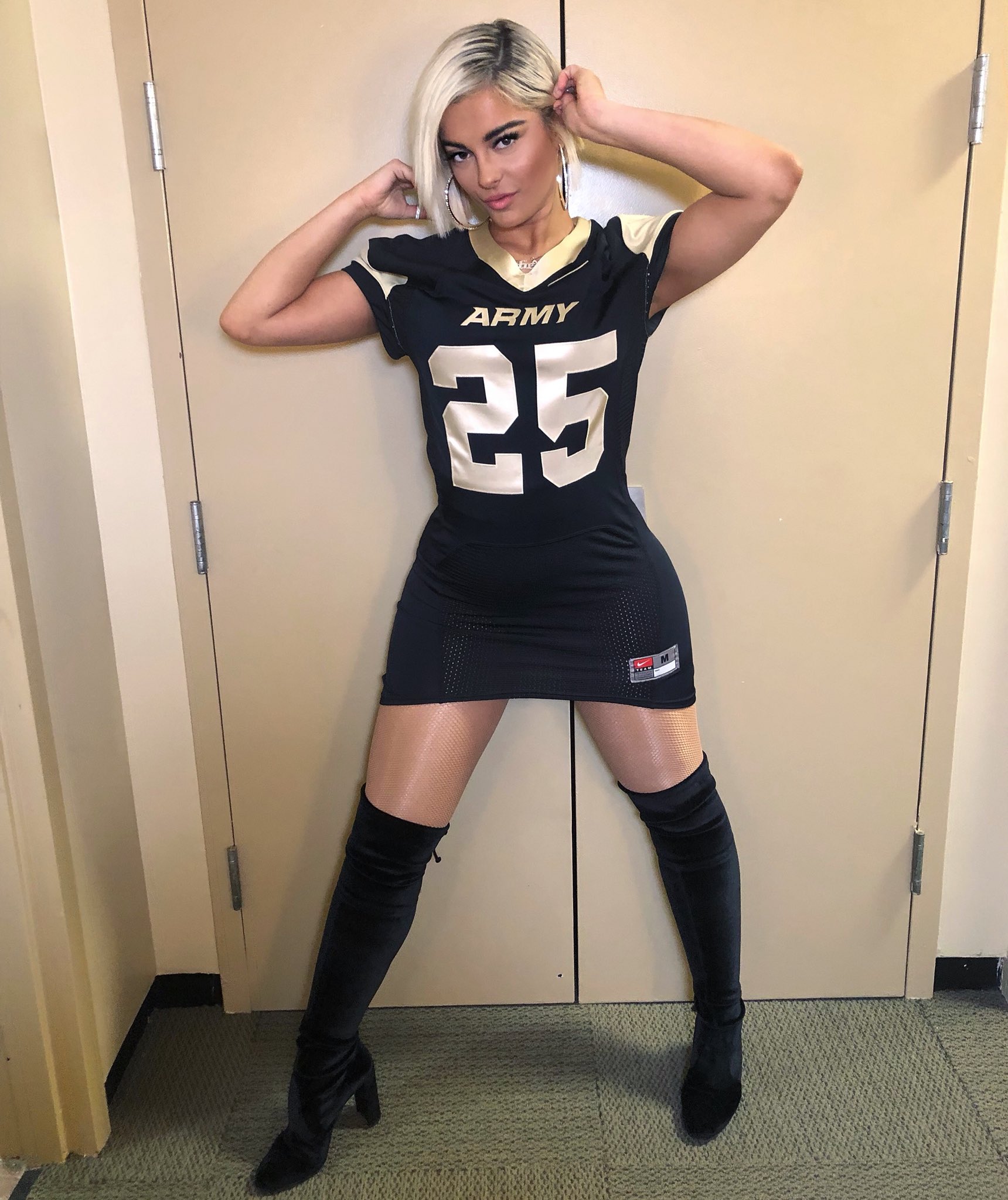Bebe rexha top thigh high boots