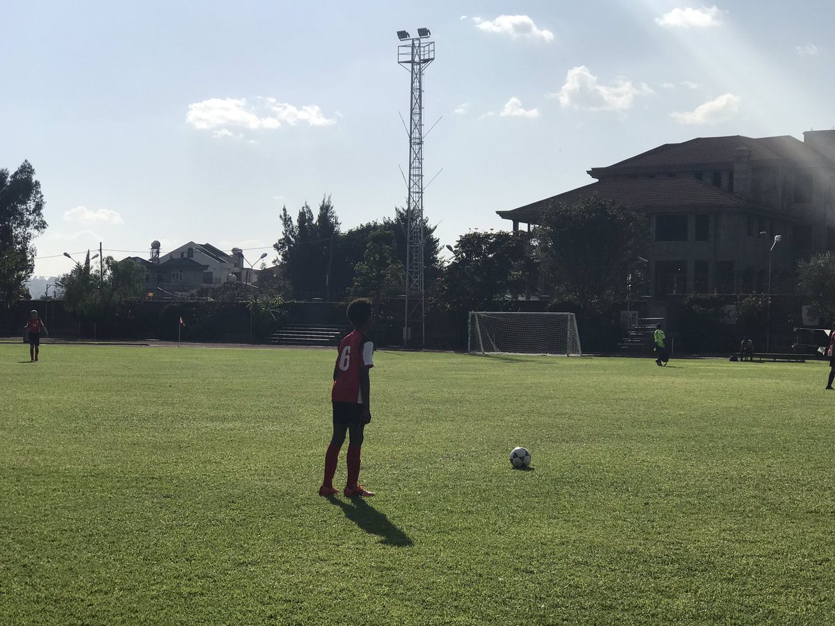 Another of our U14 boy before he kicked a ball, in their warming up time before their game against Bingham. As seen, His other teammate is waiting to receive the pass. 
By: Yanet #weareics