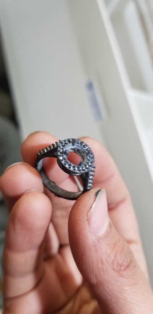 SethRolly's tweet photo. Lost wax casting with 3d printed object was a success ..made my bronze ring with castable wax resin on Form 2 3d printer.. thanks @formlabs for the samples. Still have to do cleaning, polishing and stone setting on the ring #3dprinting #lostwax #casting #BronzeRing https://t.co/7p0erSJahE