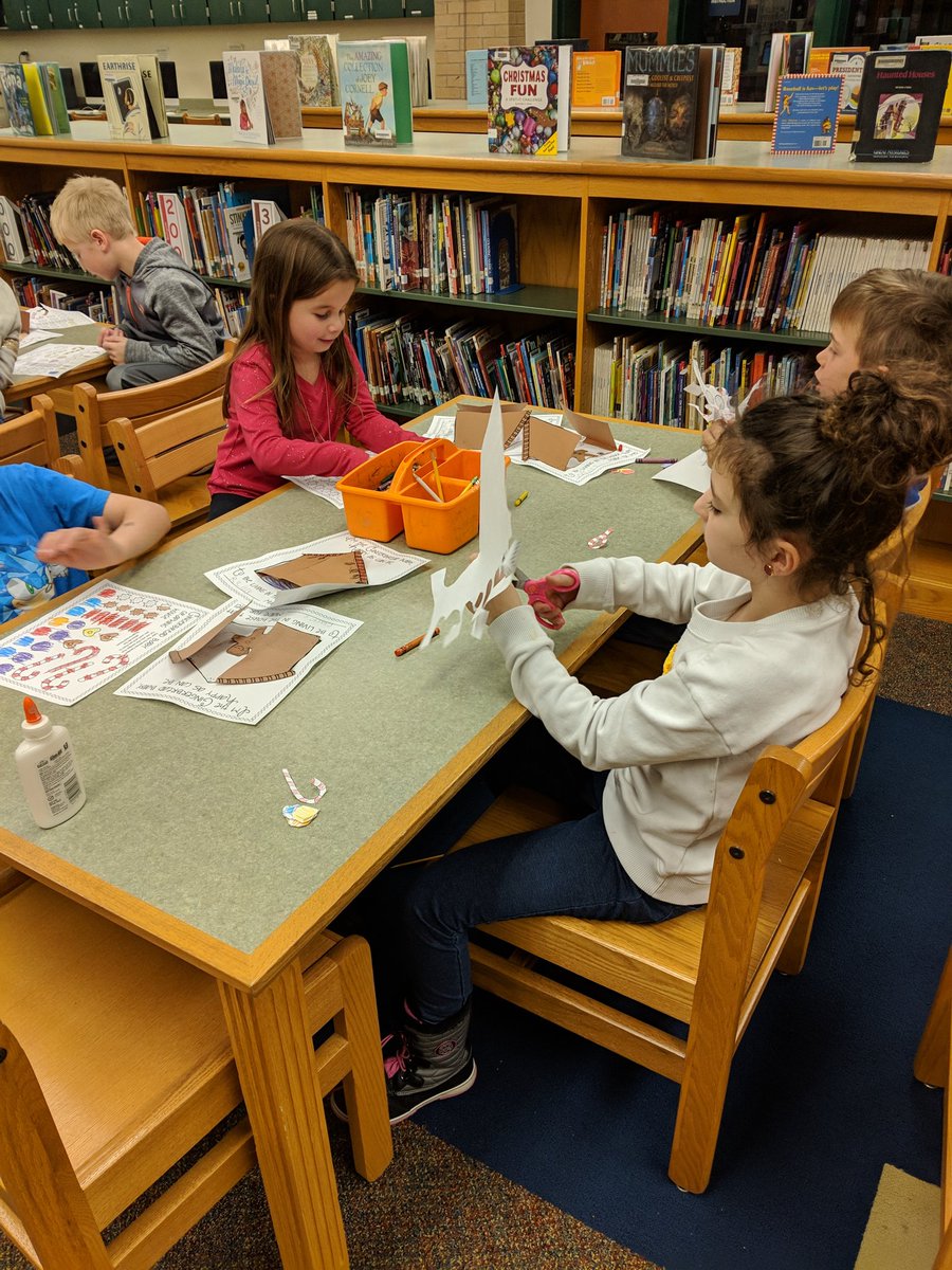 os_librarian's tweet photo. 1st grade decorating their gingerbread houses before they start graphing candies! #mathinlibrary #Libraries #gingerbreadbaby https://t.co/BcqNxyUgSI