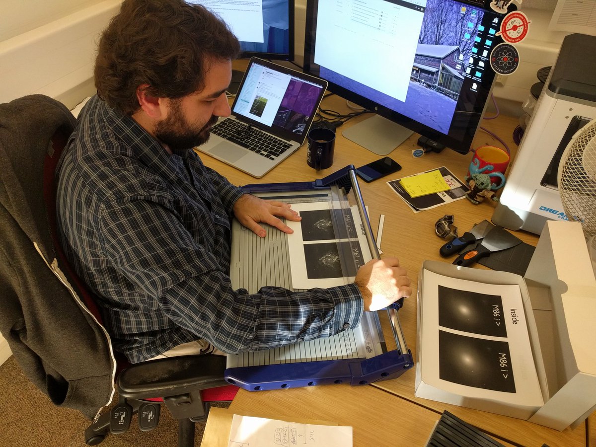 <a href="/ColemanKrawczyk/">Coleman Krawczyk</a> cutting out galaxy image 246 of 400. Thanks to the feedback from our original VI test group, our transparent  tactile images have pictures like these embedded in them, letting anyone use whatever mix of sight and touch suits them. User Centred Design in action!