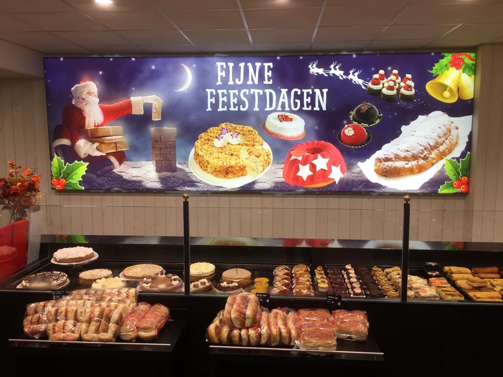Een mooie kerstgroet voor Bakkerij Bekkers in een EasyFix LED textielframe.