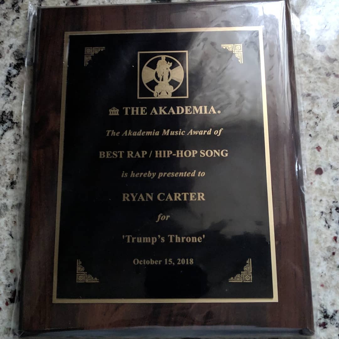 RyaCart91's tweet photo. Thank you to the @AkademiaAwards for honoring my song "Trump's Throne" as Best #Rap/#HipHop Song! 🎶 My 1st politically conscious song. It was tough to write, but very rewarding. Hope it helps others realize the injustice &amp; inequality we face today in America.🇺🇲 #MondayMotivation https://t.co/CXQZTmQfz1